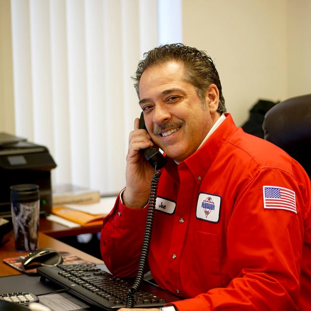 A Reimer manager answers the phone to help a local customer with their HVAC repairs in Buffalo, NY.